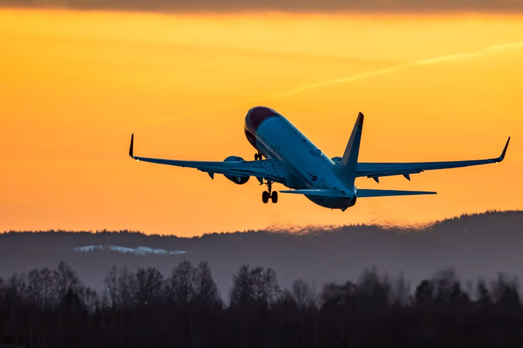 Norwegian take-off during sundown