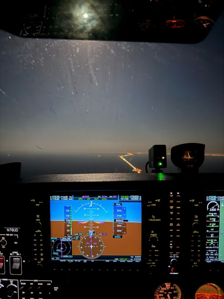 cockpit cessna flying during night
